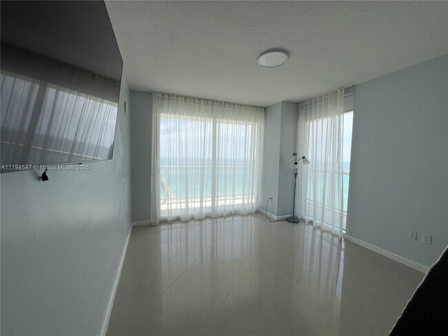 Building Photo - 16699 Collins Ave