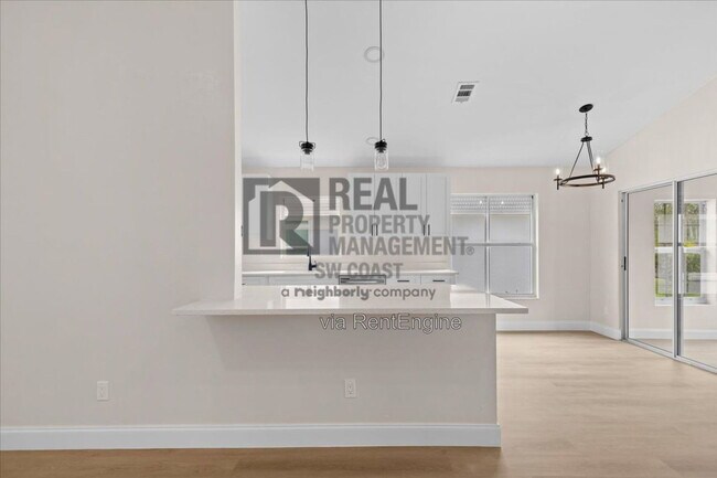 Building Photo - 3358 Sabal Springs Blvd