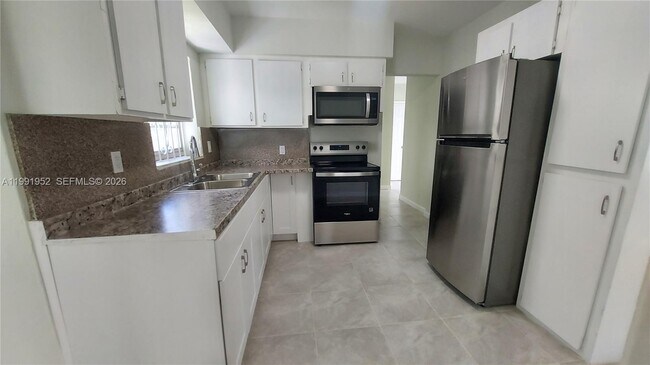 Building Photo - 8915 NW 10th Ave