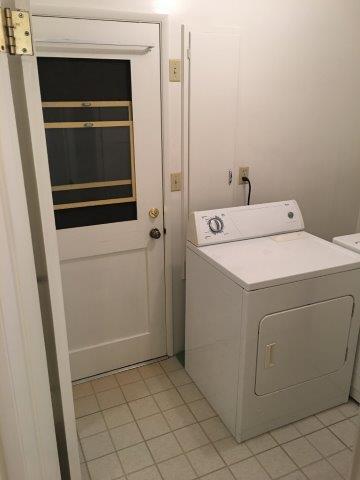 View of private exit door to the enclosed backyard. - 60 Cold Springs Rd, Apt