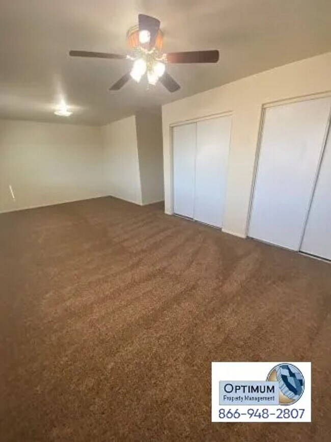 Building Photo - Spacious 4-Bedroom Home with 3-Car Garage & Downstairs Suite!