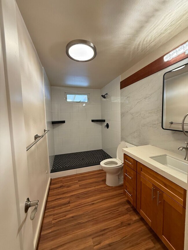 Building Photo - Upper Kalaheo, fully renovated three-bedroom two bathroom home.