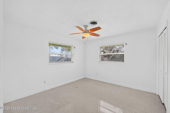 Building Photo - Welcome to this beautifully remodeled 4-bedroom, 3-bath home in the heart of Indialantic Beach!