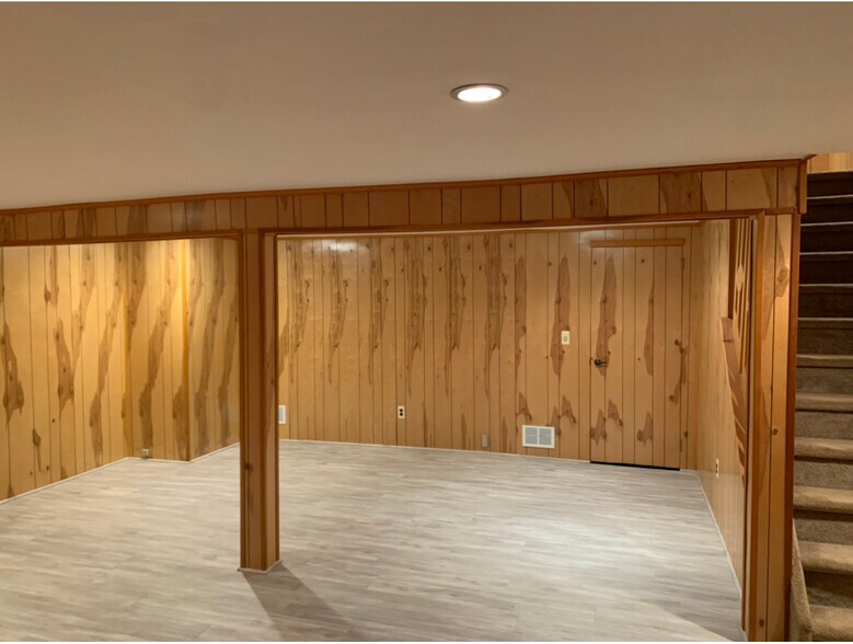 Finished Basement - new pergo floor - 1702 Regents Ct
