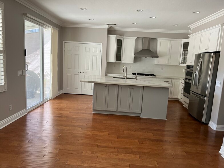 Kitchen with island - 24040 Dandelion Ln