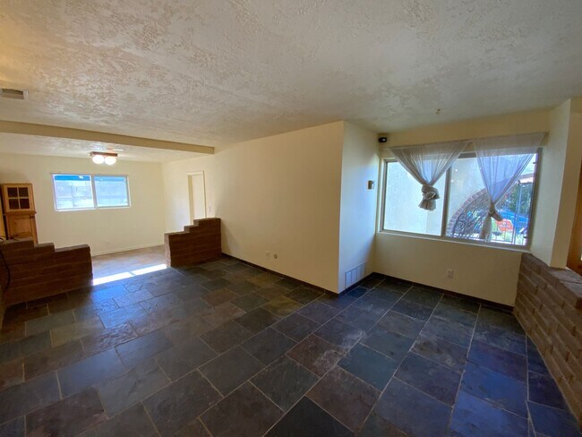 Building Photo - 4 Bedroom Single Story Home Available Near Tramway Blvd NE & Copper Ave NE!