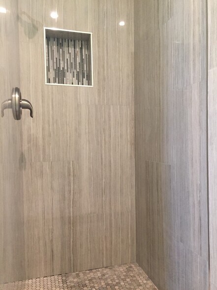 tiled primary en-suite shower walls. - 1214 Rutland Rd
