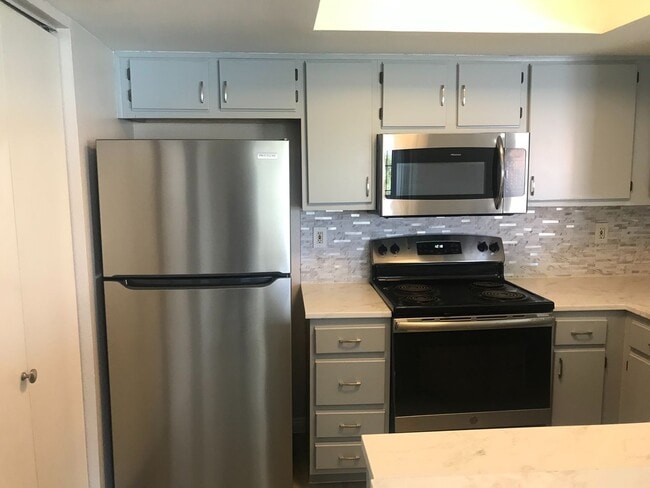 Building Photo - ** COMING SOON ** Modern Boca Park Apartment with Stainless Steel Appliances & Open-Concept Living