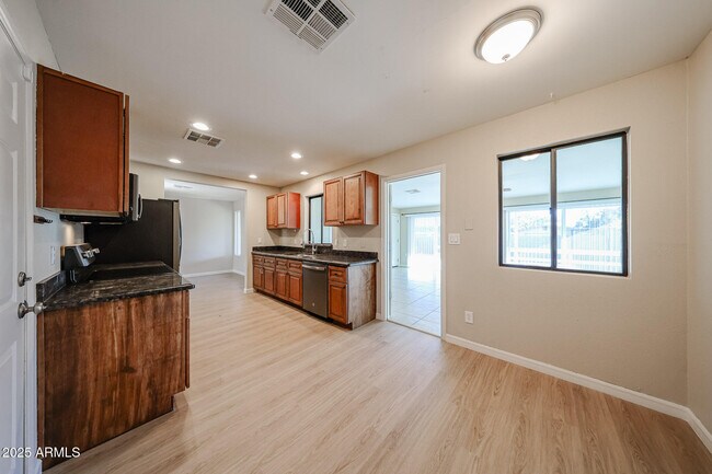 Building Photo - 6539 E Arbor Ave