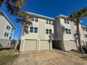 Building Photo - Completely renovated 2 bedroom 2 bath waterfront condo for rent near Pensacola Beach!