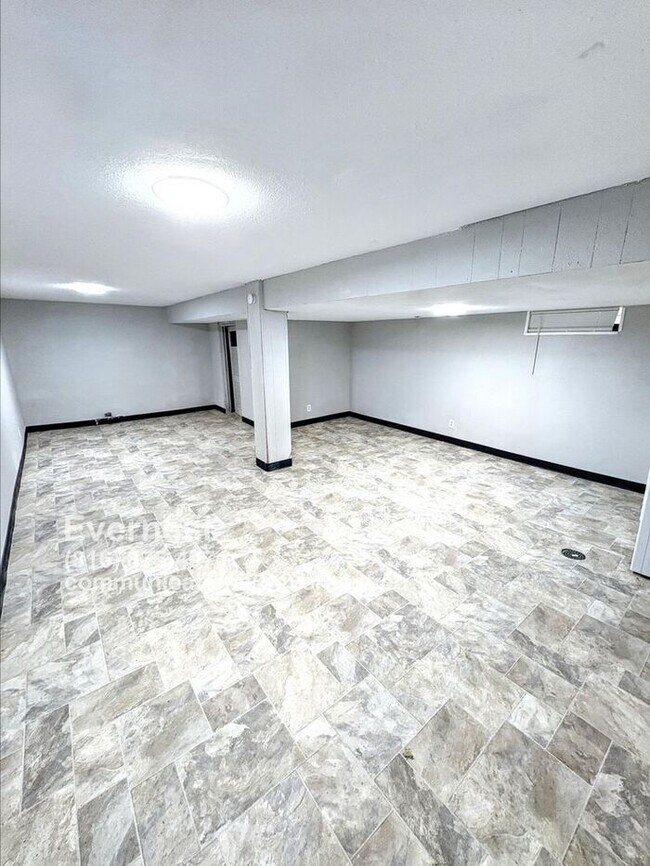 Building Photo - Charming 4-Bedroom Home with Finished Base...
