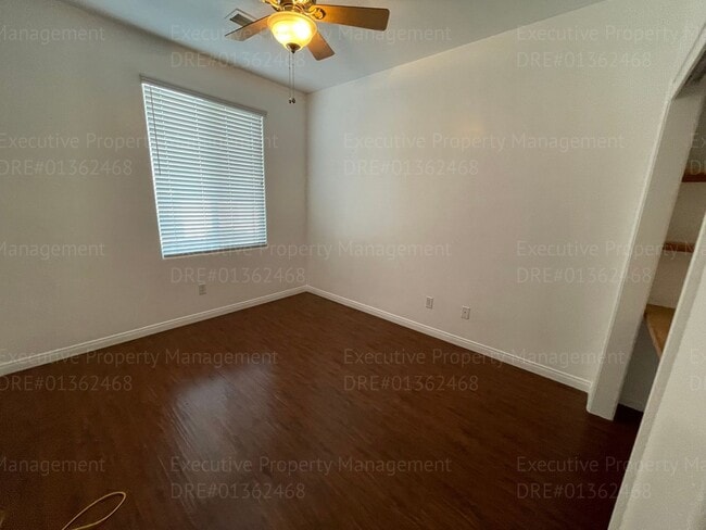 Building Photo - 4 bedrooms/ 2 bathrooms, with a patio.