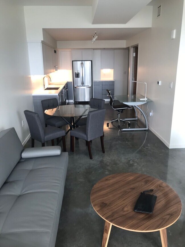 Building Photo - AVAILABLE SPRING 2027 - Downtown Iowa City High-Rise Condo with Amazing Views