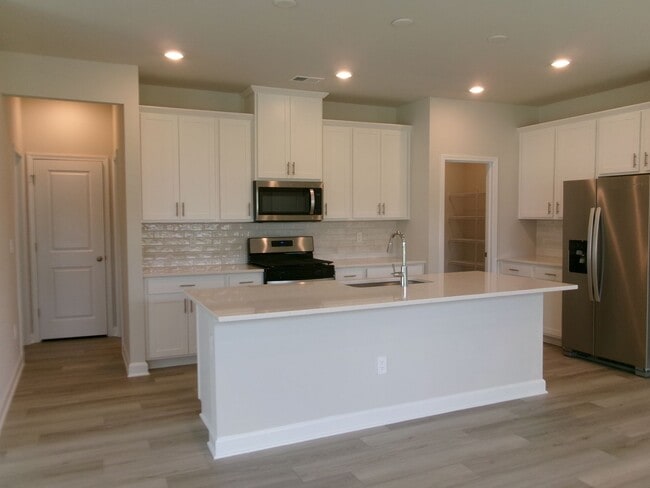 Building Photo - New Construction corner lot 5 bedroom home...