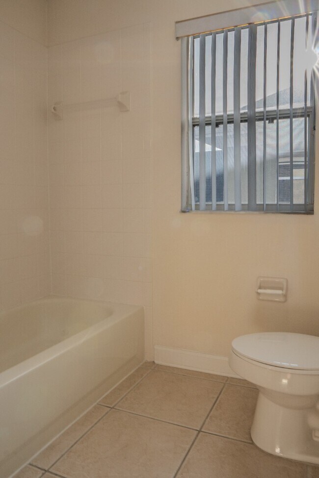 Building Photo - Spacious 5BR Home in Falcon Trace | 3-Car Garage | Screened Patio | Resort-Style Amenities Rent: ...