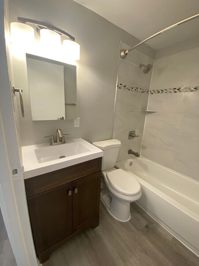 Bathroom #1- fully renovated - 1861 Village Green Dr