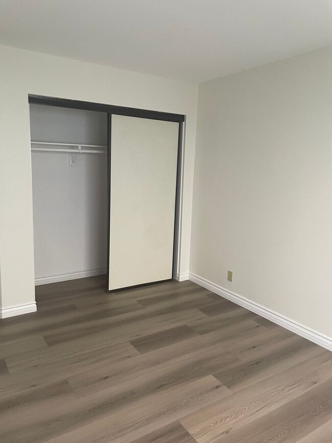 Building Photo - NEW PAINT AND FLOORING
