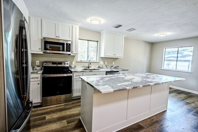 Building Photo - Brand New 2x1! Fully Renovated throughout!...