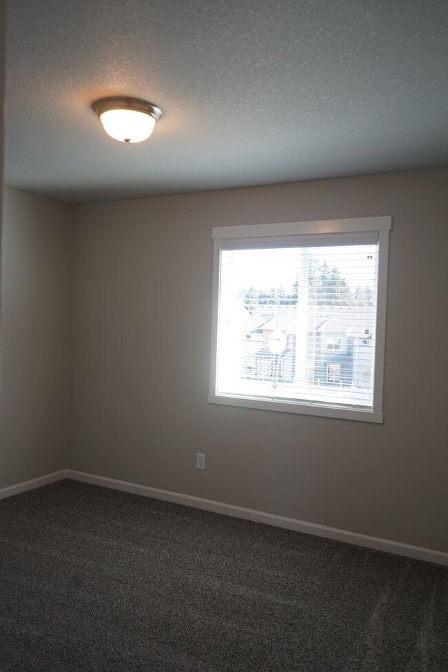 Building Photo - BRAND NEW Prairie Commons Luxury Townhome ...