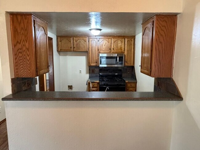 Building Photo - Adorable cottage style three bed, two bath, two car garage home in Moore Schools!