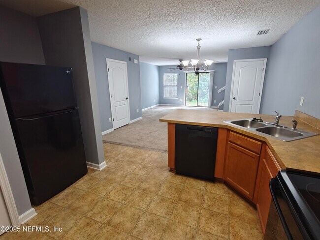 Building Photo - 7764 Playschool Ln