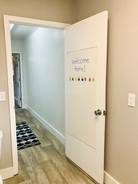 White board on door - 9225 Amos Rd