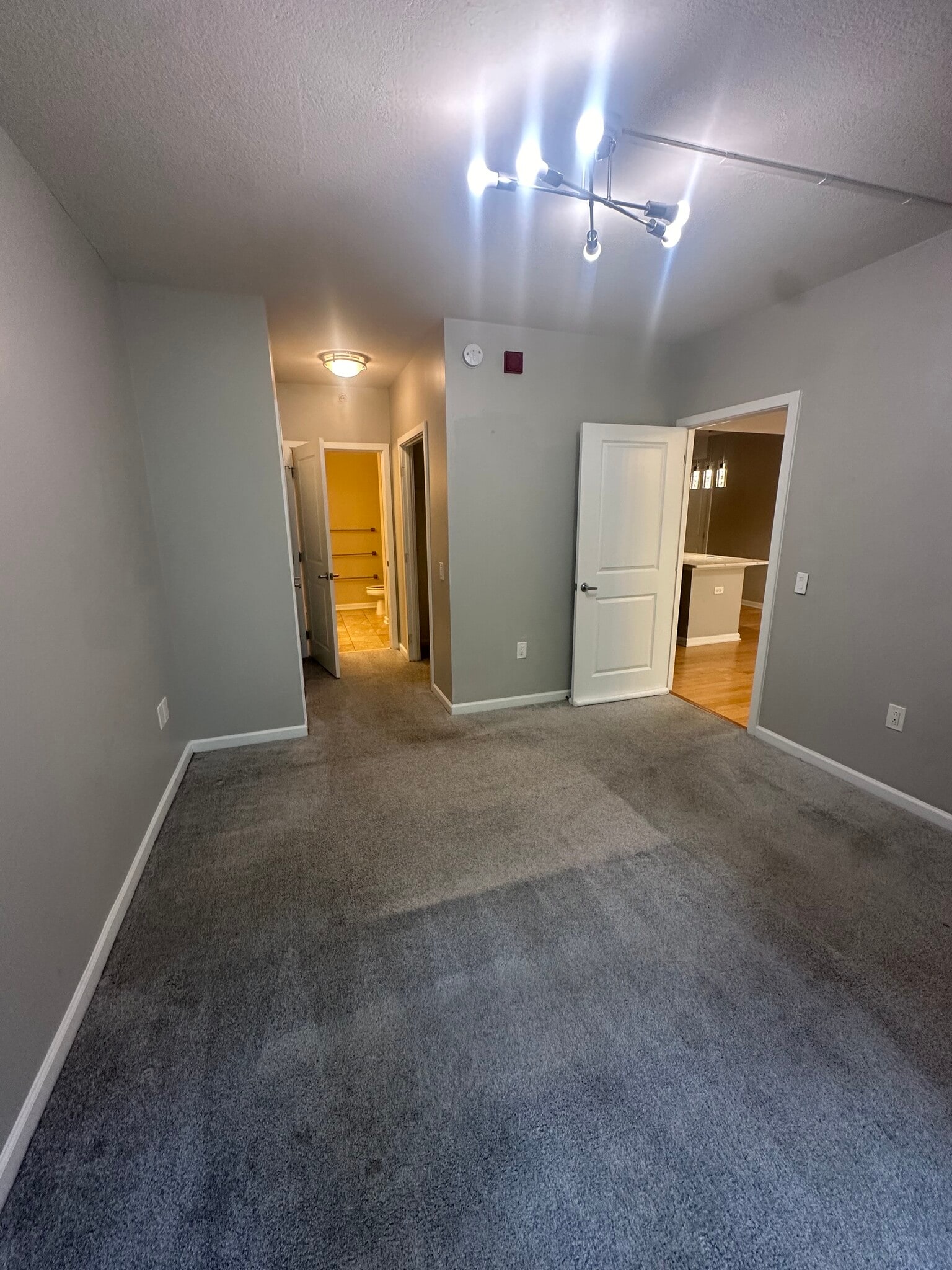 Ignore (other half) - Primary bedroom view from window. 3 closets and bathroom in back. - 440 L St NW