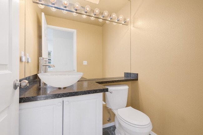 Building Photo - End Unit 2 Story Townhome Plus Bonus Office Area - 2 Car Garage