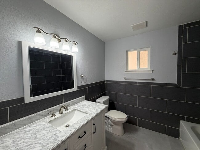 Building Photo - Beautifully Remodeled 3 Bedroom Single Story Home Available Near Golf Course Rd NW & McMahon Blvd...