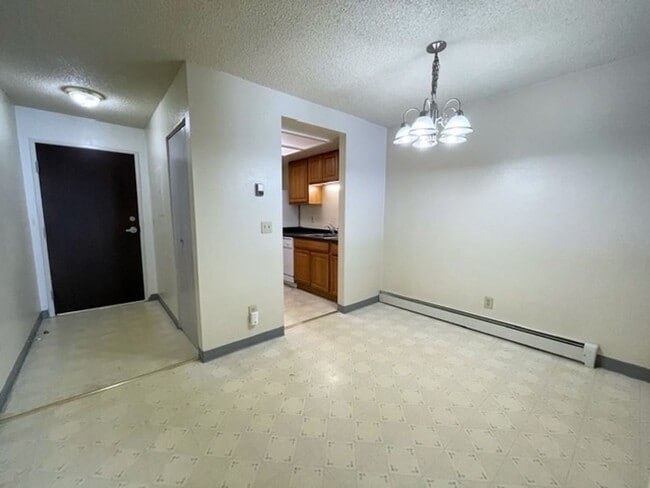 Building Photo - East Anchorage Condo with Laminate Floorin...
