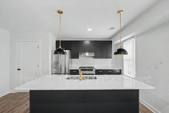 Building Photo - 201 A W 37th St