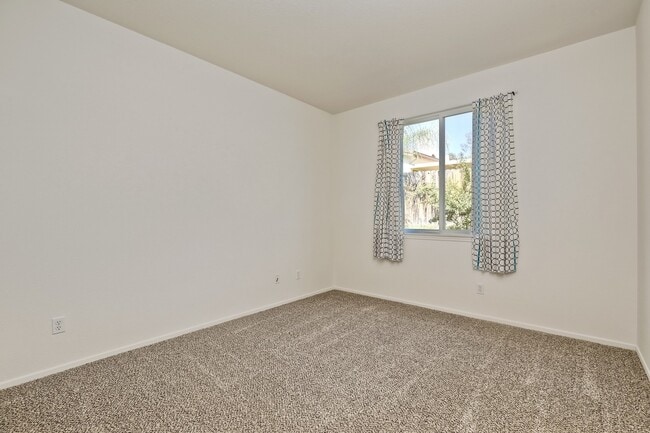 Building Photo - Charming 1-Story Corner Lot Home with Great Room & Patio