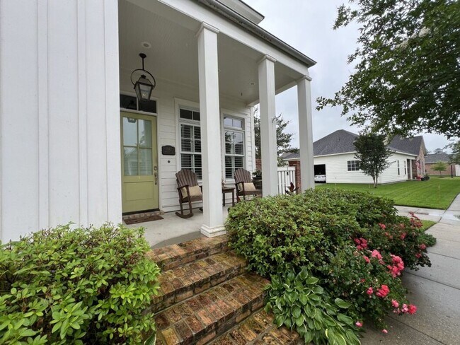 Building Photo - Luxury 4BR Home in Americana | 11 Ft Ceilings, Courtyard Living & Furnished Option at $3,950