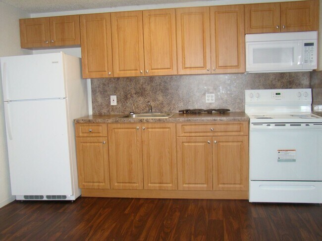 Building Photo - Move-In Special: One Month FREE + Competit...