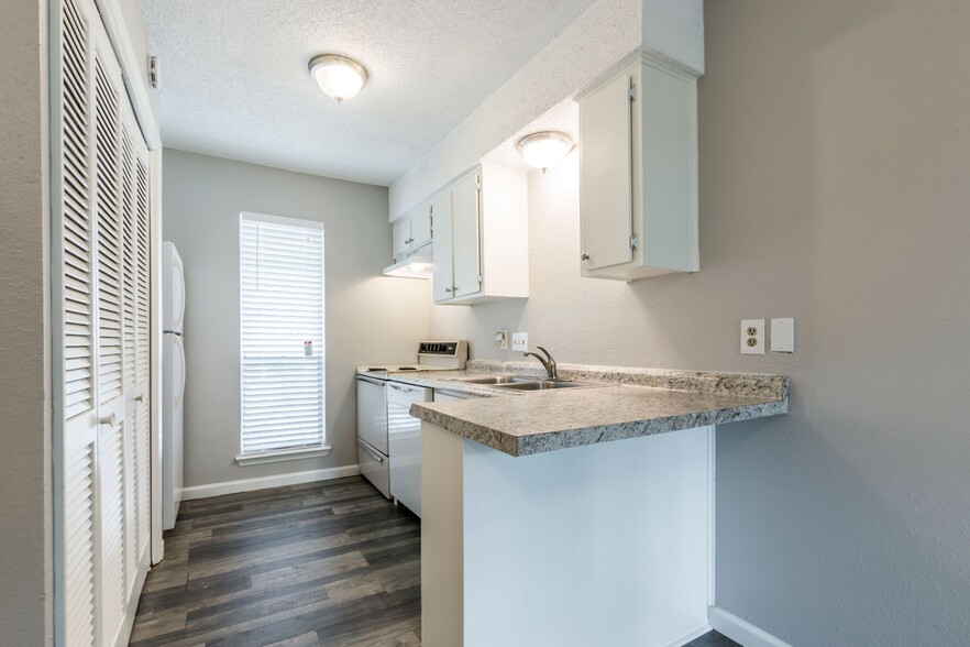 Room for 2 bar stools at countertop - Shady Oaks