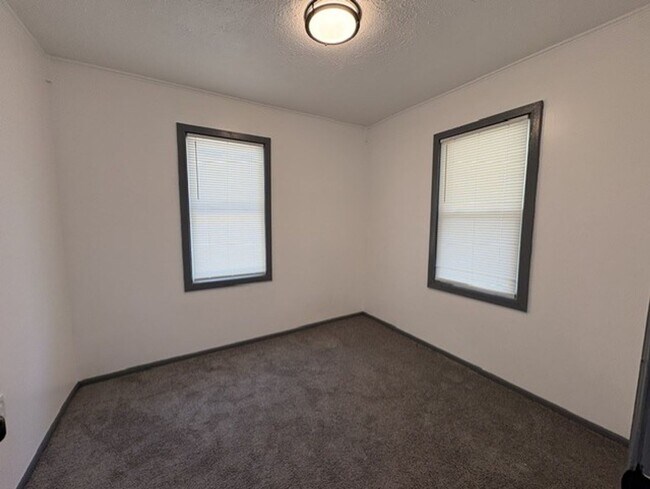 Building Photo - Move-In Ready 2-Bedroom Home with Modern Kitchen, Basement & Front Porch