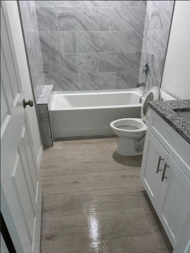 Building Photo - MUST SEE-BRAND NEW THREE BEDROOM, 2 BATH, ...