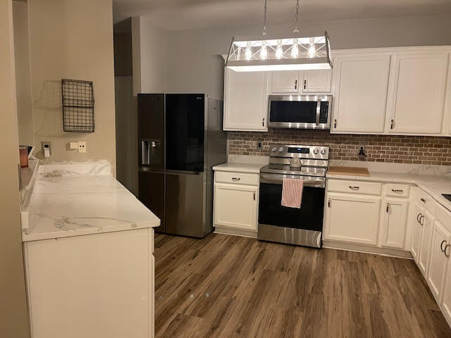 Building Photo - Welcome to this stunning 4-bedroom, 3-bath...