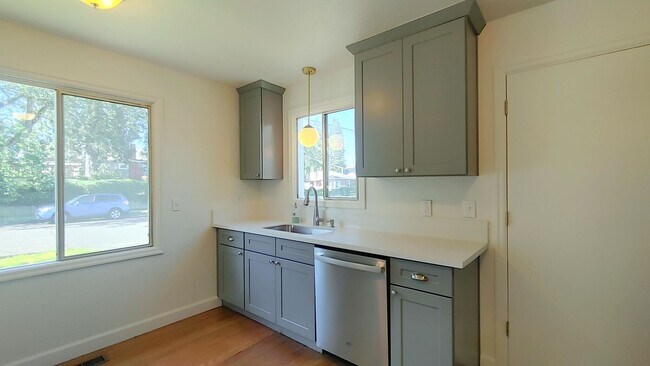 Building Photo - Darling Updated Cottage with New Kitchen a...
