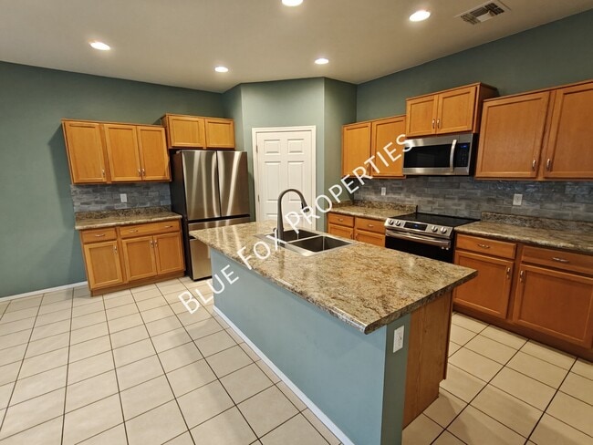 Building Photo - 10947 E Passion Flower Ln