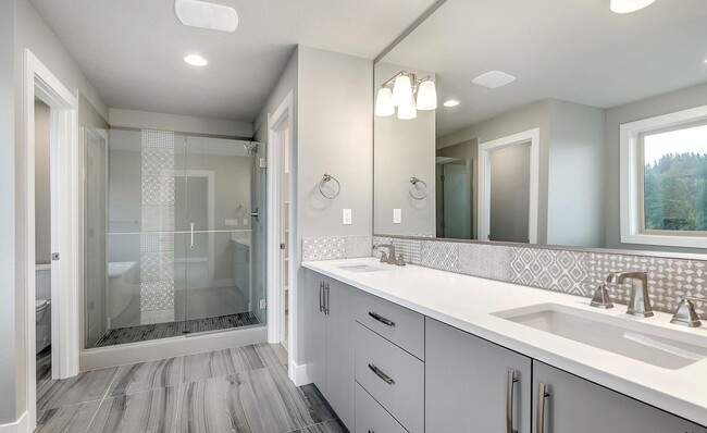 Building Photo - Bethany Stunner - 5 Bedrooms with Main-Level Bed & Bath, Modern Kitchen & Private Fenced Yard