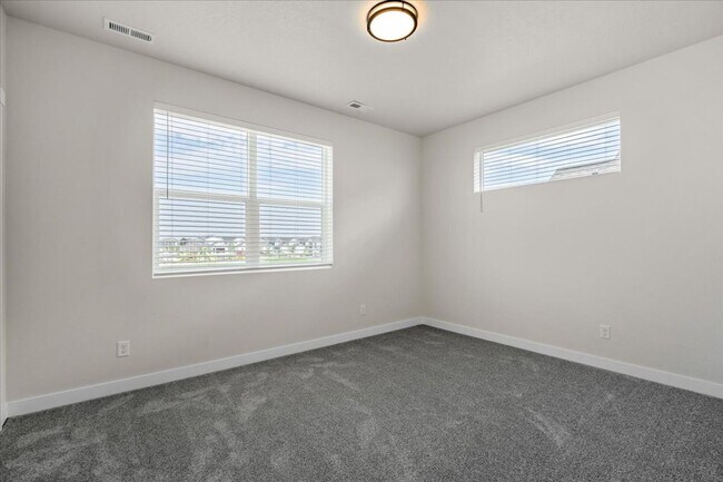 Building Photo - Brand New, Stylish 4-Bedroom Home with Vaulted Ceilings and Private Patio