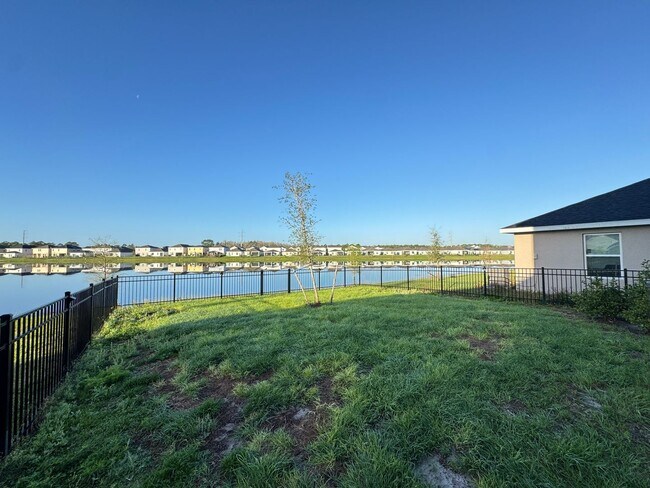 Building Photo - Beautiful Harmony Central Water Front Home AVAILABLE NOW!