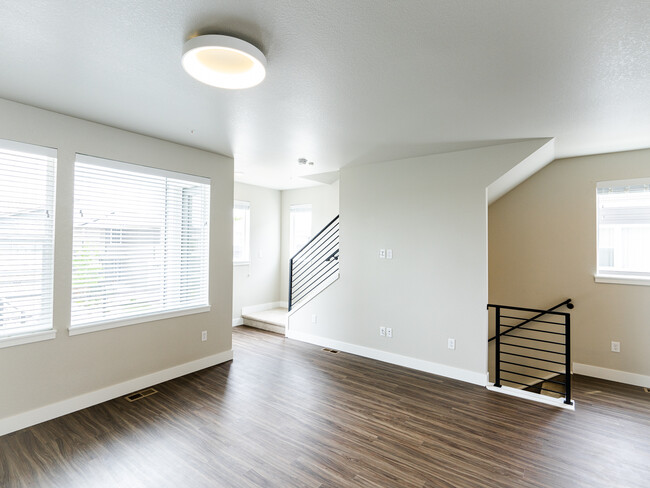 Living area, balcony outside the windows on the left - 2863 W 69th Ave