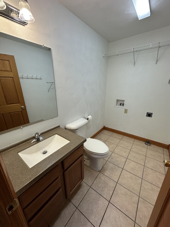 Half bath with washer & dryer hookups - 1052 Lakeshore Dr