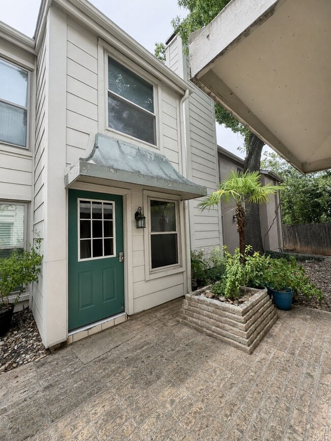 Building Photo - Single-level living on ground floor  |  Fresh paint (July 2026)  |  2 carports  |  Community Pool...