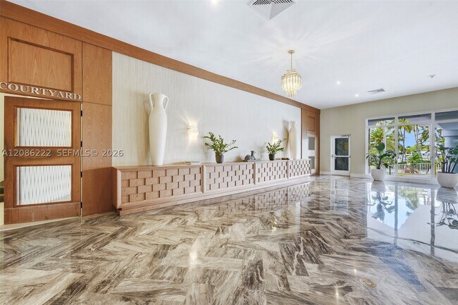 Building Photo - 5401 Collins Ave
