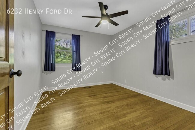 Building Photo - 6232 Henry Ford Dr