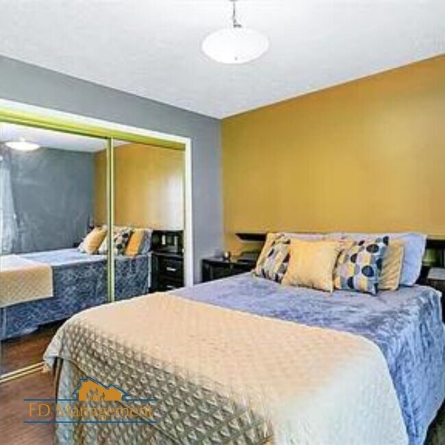 Building Photo - Modern First-Floor with Private Patio in Hampton Club