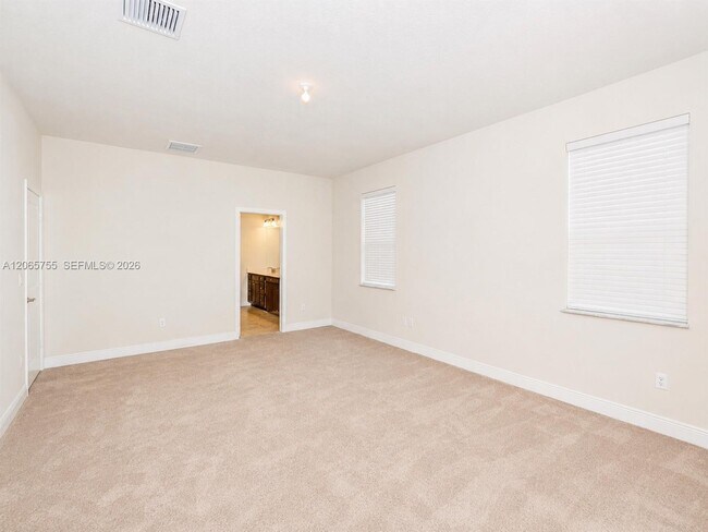 Building Photo - 10976 SW Tessili Wy